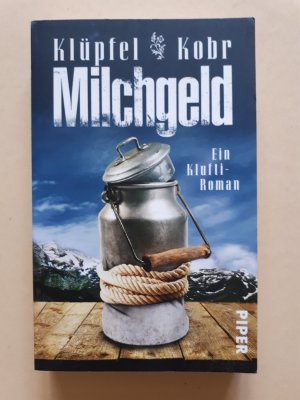 gebrauchtes Buch – Volker Klüpfel – Milchgeld - Ein Klufti-Roman