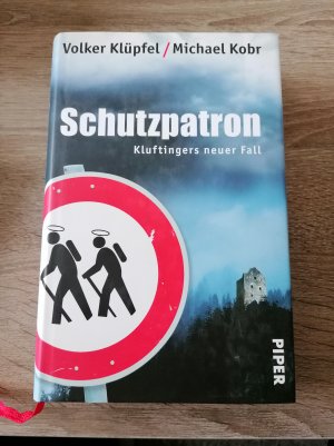 gebrauchtes Buch – Klüpfel, Volker; Kobr, Michael – Schutzpatron - Kluftingers neuer Fall