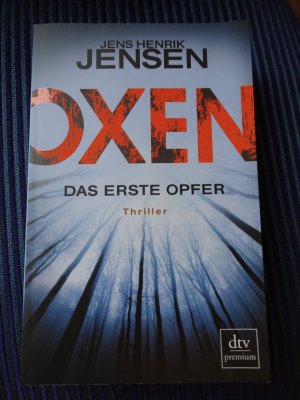 gebrauchtes Buch – Jensen, Jens Henrik – Oxen. Das erste Opfer