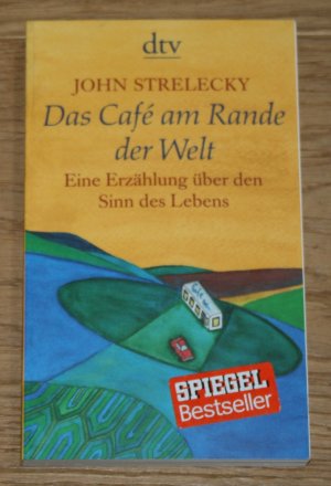 gebrauchtes Buch – Strelecky, John P – Das Café am Rande der Welt: Eine Erzählung über den Sinn des Lebens.