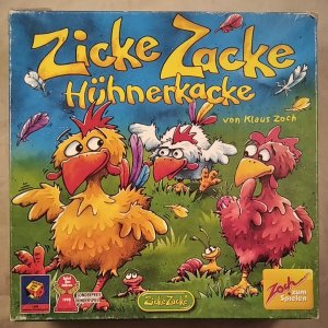 Zicke Zacke Hühnerkacke (Holzspielsteine)[Kinderspiel]. Spiel des Jahres 1998. Achtung: Nicht geeignet für Kinder unter 3 Jahren.