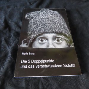 Die 5 Doppelpunkte und das verschwundene Skelett