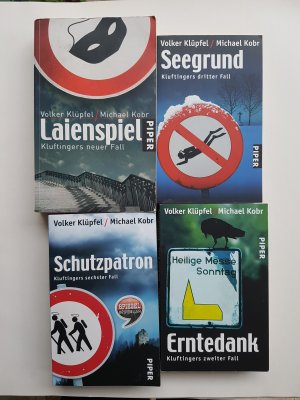 gebrauchtes Buch – Klüpfel, Volker; Kobr, Michael – 4 Bücher: Laienspiel - Kluftingers neuer Fall / Seegrund – Kluftingers dritter Fall / Schutzpatron – Kluftingers sechster Fall / Erntedank