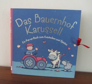 Das Bauernhof-Karussell - ein Pop-up-Buch zum Entdecken und Spielen.