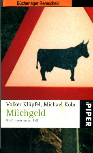 gebrauchtes Buch – Klüpfel, Volker und Michael Kobr – Milchgeld. Kommissar Kluftingers erster Fall