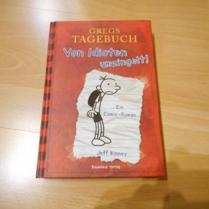 gebrauchtes Buch – Jeff Kinney – Gregs Tagebuch - Von Idioten umzingelt!