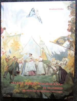 "Sankt Maria Magdalena" in Maisried. Die Kirche auf dem goldenen Leiterwagen.