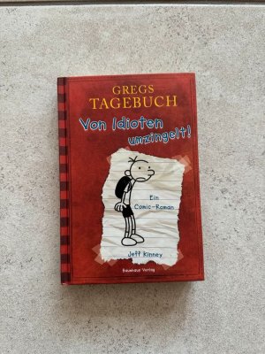 gebrauchtes Buch – Jeff Kinney – Gregs Tagebuch - Von Idioten umzingelt!