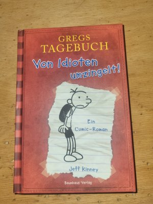 gebrauchtes Buch – Jeff Kinney – Gregs Tagebuch - Von Idioten umzingelt!