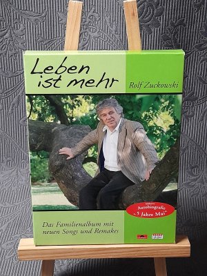 gebrauchter Tonträger – Rolf Zuckowski – Leben ist mehr (CD + Taschenbuch-Autobiografie)