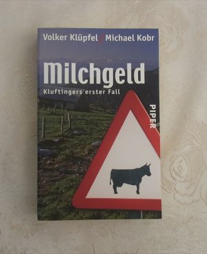 gebrauchtes Buch – Klüpfel, Volker; Kobr, Michael – Milchgeld - Kluftingers großer Fall