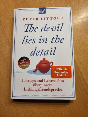 gebrauchtes Buch – Peter Littger – The devil lies in the detail  - Lustiges und Lehrreiches über unsere Lieblingsfremdsprache