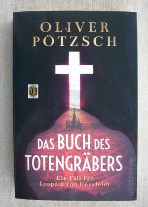 gebrauchtes Buch – Oliver Pötzsch – Das Buch des Totengräbers - Ein Fall für Leopold von Herzfeldt