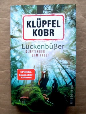 gebrauchtes Buch – Klüpfel, Volker; Kobr, Michael – Lückenbüßer. Kluftinger ermittelt.