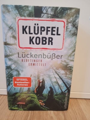 gebrauchtes Buch – Klüpfel, Volker; Kobr, Michael – Lückenbüßer (Kluftinger-Krimis 13) - Kluftinger ermittelt | Klufti isch bäck!