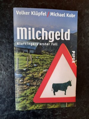 gebrauchtes Buch – Volker Klüpfel – Milchgeld - Kluftingers erster Fall