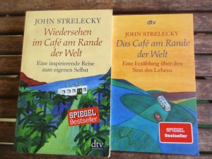 gebrauchtes Buch – John Strelecky – Bücherset - Das Cafe am Rande der Welt (Eine Erzählung über den Sinn des Lebens) / Wiedersehen im Cafe am Rande der Welt (Eine inspiriendene Reise zum eigenen Selbst)