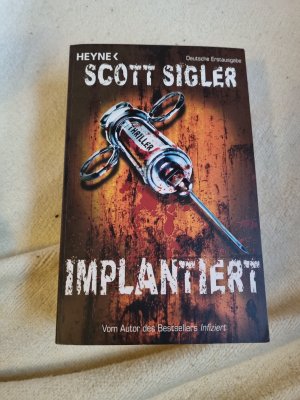 gebrauchtes Buch – Scott Sigler – Implantiert (Thriller)