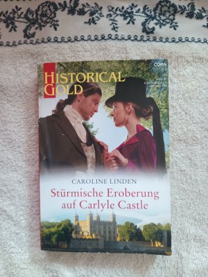 gebrauchtes Buch – Caroline Linden – Stürmische Eroberung auf Carlyle Castle (Historical Gold 399)