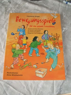 gebrauchtes Buch – Constanze Grüger – Bewegungsspiele für eine gesunde Entwicklung  - mit Illustrationen von Anne Wöstheinrich