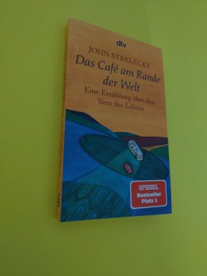 gebrauchtes Buch – John Strelecky – Das Café am Rande der Welt - Eine Erzählung über den Sinn des Lebens