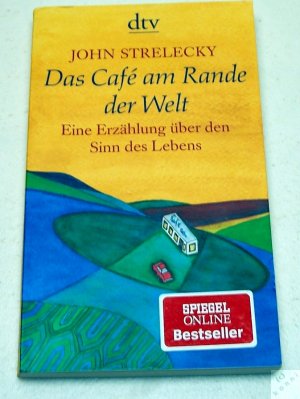 gebrauchtes Buch – John Strelecky – Das Café am Rande der Welt - Eine Erzählung über den Sinn des Lebens