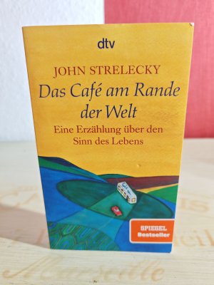 gebrauchtes Buch – John Strelecky – Das Café am Rande der Welt - Eine Erzählung über den Sinn des Lebens