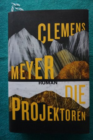 gebrauchtes Buch – Clemens Meyer – Die Projektoren - Roman | Ausgezeichnet mit dem Bayerischen Buchpreis 2024