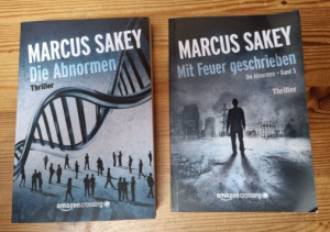 gebrauchtes Buch – Marcus Sakey – 2 x Thriller - Die Abnormen + Mit Feuer geschrieben (Band 1 + 3)