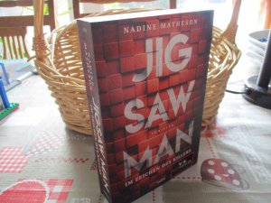 gebrauchtes Buch – Nadine Matheson – Jigsaw Man - Im Zeichen des Killers - Band 1 -