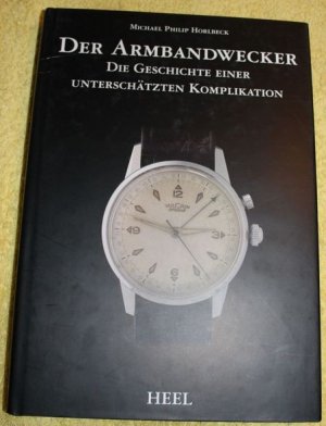 Der Armbandwecker. Die Geschichte einer unterschätzten Komplikation. Mit Fotos von Arne Psille