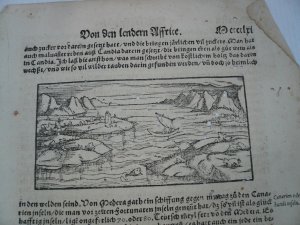 Kanarische Inseln, anno 1550, S. Münster, Cosmographie    --aus einer frühen Ausgabe; seltene Beschreibung der Kanaren, stark wurmstichig, gering gebräunt. Blatt: 30 x 20 cm..  Canary Islands, anno 1550, Sebastian Muenster, Cosmographia  --1 page from an early edition of the Cosmographia, brownish, a lot  of wormholes. Size: 30 x 20 cm., some tears on margins