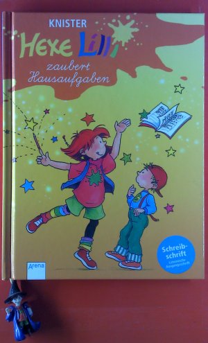 Hexe Lilli zaubert Hausaufgaben. Schreibschrift