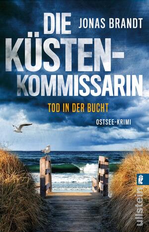 gebrauchtes Buch – Jonas Brandt – Die Küstenkommissarin – Tod in der Bucht (Frida Beck ermittelt 2) - Ostsee-Krimi | Ein kniffliger Fall in der Lübecker Bucht und jede Menge Ostseeflair