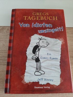 gebrauchtes Buch – Jeff Kinney – Gregs Tagebuch - Von Idioten umzingelt!